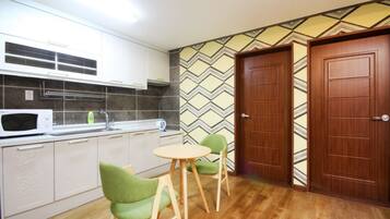 Condo, Kitchenette | Living area | 42-inch flat-screen TV with cable channels, TV