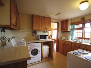Dishwasher, highchair, cookware/dishes/utensils