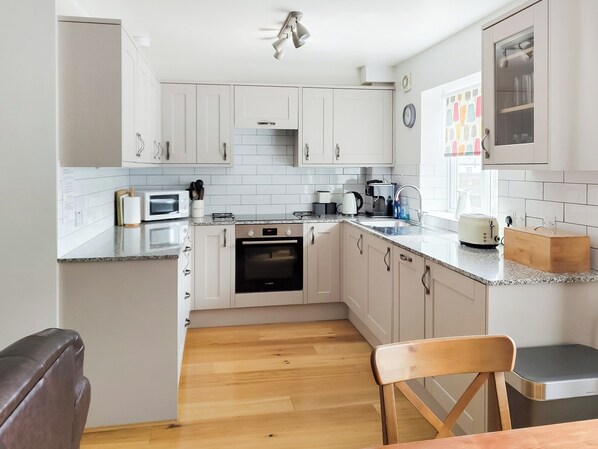 Dishwasher, high chair, cookware/dishes/utensils