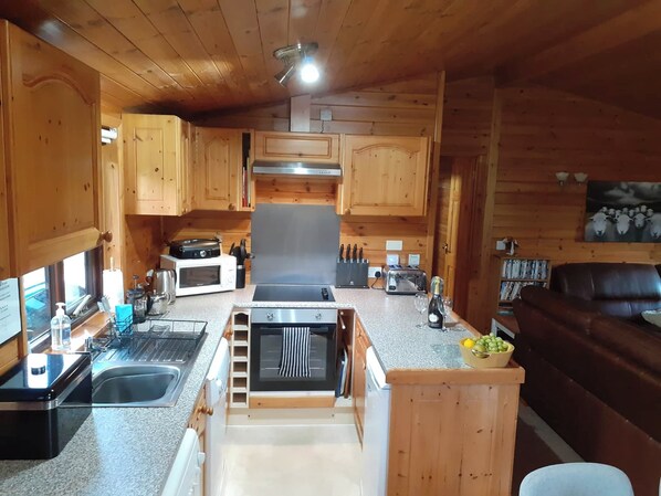 Dishwasher, high chair, cookware/dishes/utensils
