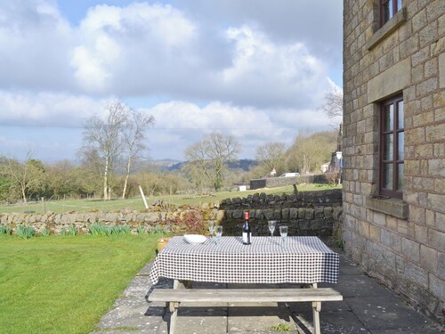 A detached farmhouse with views down the Derwent Valley.
