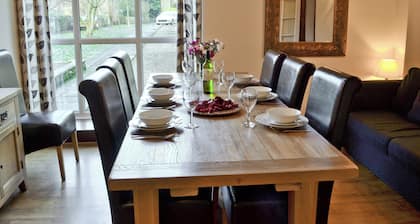 Ground Floor:
Living room: TV, Sky, Open Fire
Dining room.