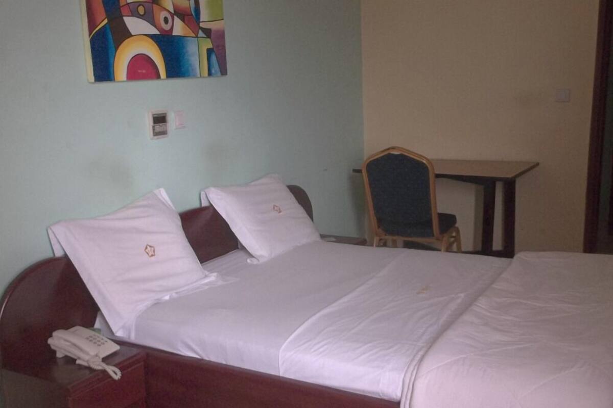 Desk, blackout curtains, rollaway beds, free WiFi