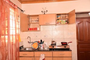 Apartment, 1 Double Bed, Non Smoking | Private kitchen | Full-size fridge, microwave, oven, stovetop - Sherry Homes Zuri Studio (Nairobi)