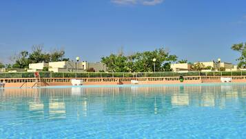 Outdoor pool, open 9:00 AM to 8:00 PM, pool umbrellas, sun loungers