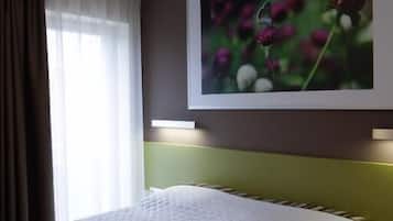 Camera Comfort con letto matrimoniale o 2 letti singoli, 1 letto queen, non fumatori | Minibar, cassaforte in camera, tende oscuranti, insonorizzazione