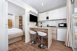 Mobil enhet - Comfort - 1 sovrum - terrass - trÀdgÄrd | Vardagsrum | 55-centimeters platt-tv med satellitkanaler och LCD-tv