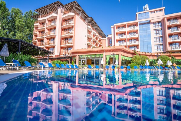 2 outdoor pools, open 9:00 AM to 6:00 PM, pool umbrellas, pool loungers