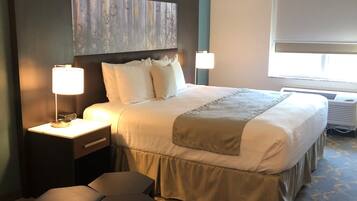 Desk, laptop workspace, blackout drapes, iron/ironing board