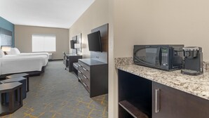 A hotel room with two beds, a desk, a television, a microwave, and a coffee maker. - Best Western Plus Isanti (Isanti)