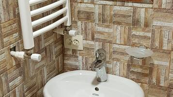 Hair dryer, soap, toilet paper