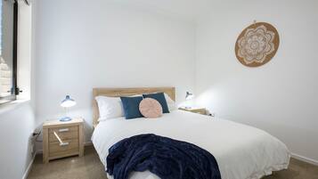 2 bedrooms, desk, iron/ironing board, travel cot