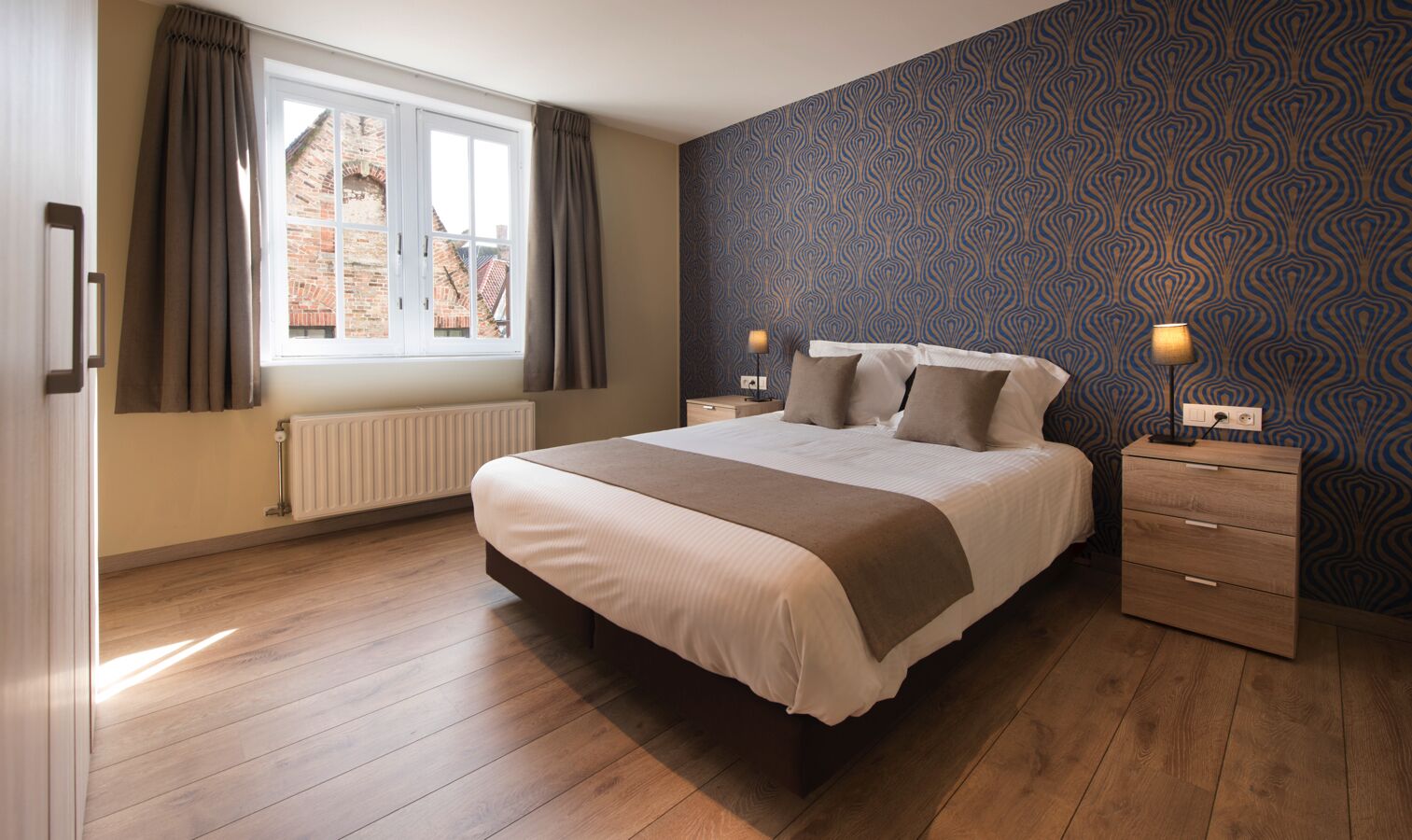 1 slaapkamer, een bureau, een strijkplank/strijkijzer, wifi