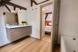 Bathtub, hair dryer, towels
