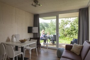 Design-hytte | Stue | Fladskærms-tv, bordtennisbord