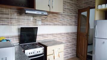 Apartemen, 3 kamar tidur | Dapur pribadi | Lemari es besar, microwave, oven, dan kompor