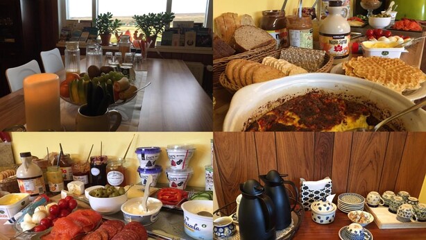 A breakfast buffet with various food items, including bread, pastries, and fruits. - Öndólfsstaðir Farm B&B (Laugar)