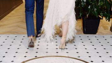 A marble floor with a logo for St. Thomas Hotel.
