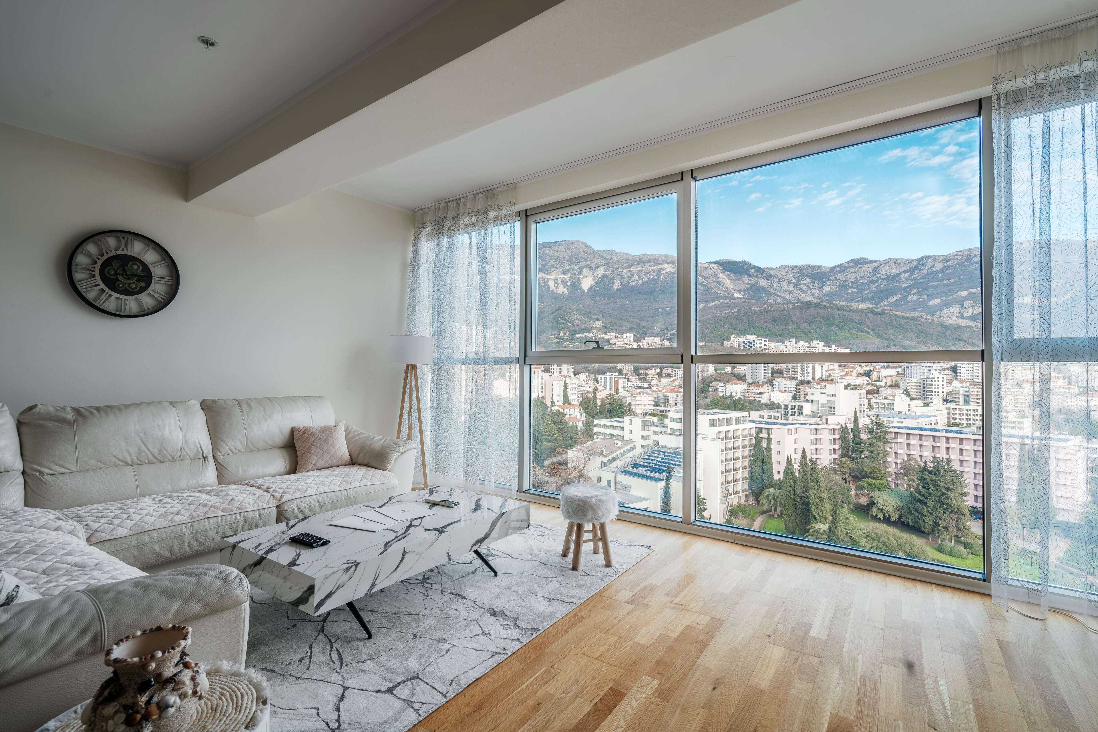 comfort apartment, 1 bedroom, sea view | living area | 42-inch flat-screen tv with cable channels