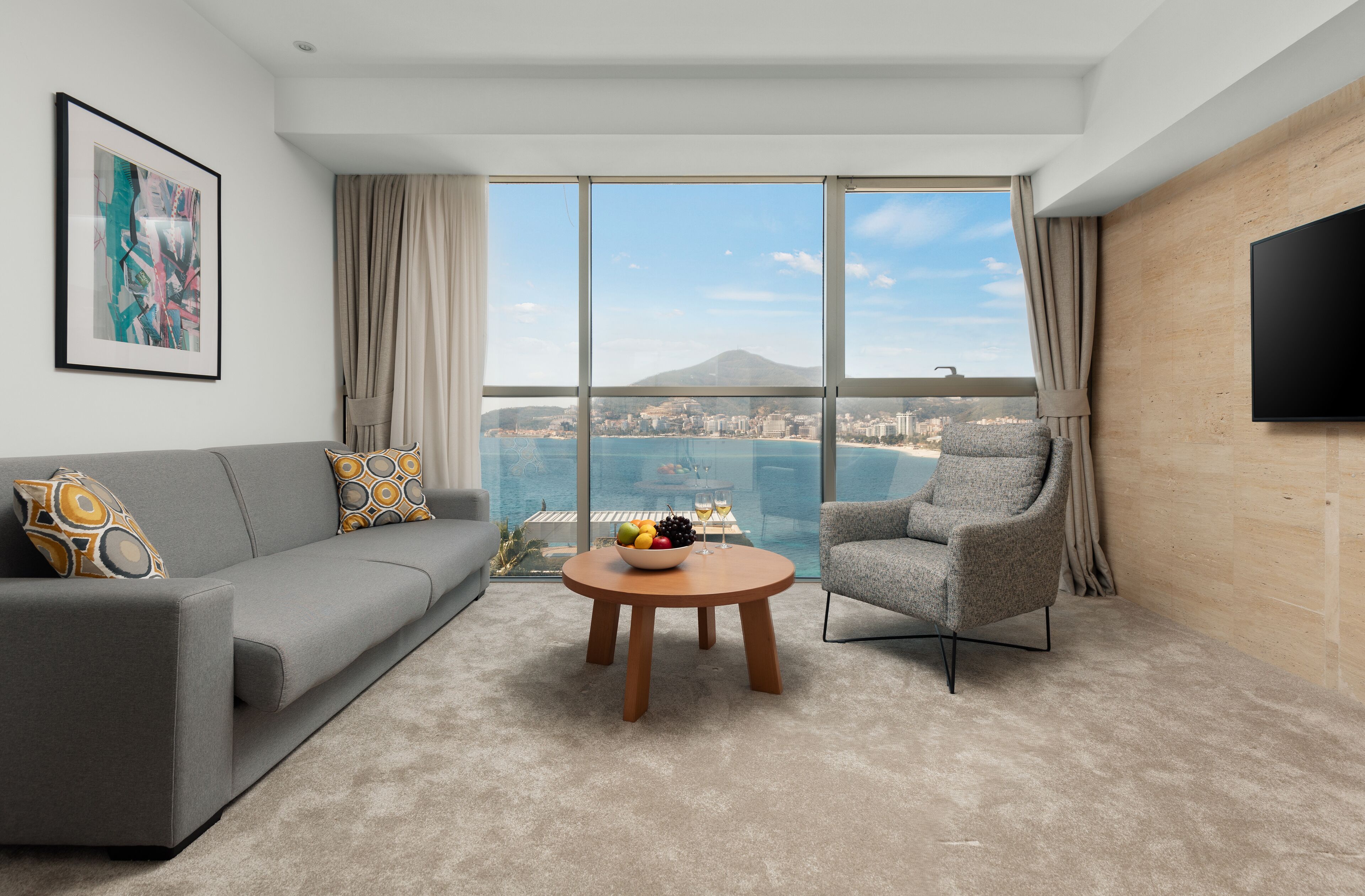 Exclusive Duplex Suite | Living area | 42-inch flat-screen TV with cable channels