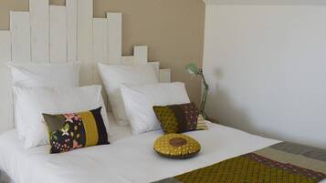 Deluxe Triple Room, Multiple Beds, Private Bathroom, Courtyard View | Premium bedding, Select Comfort beds, individually decorated