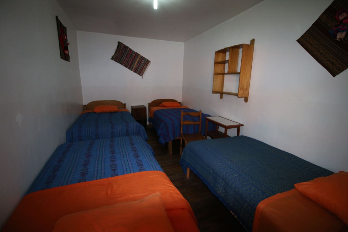 Basic Quadruple Room, Multiple Beds, Non Smoking | Cribs/infant beds, free WiFi, bed sheets