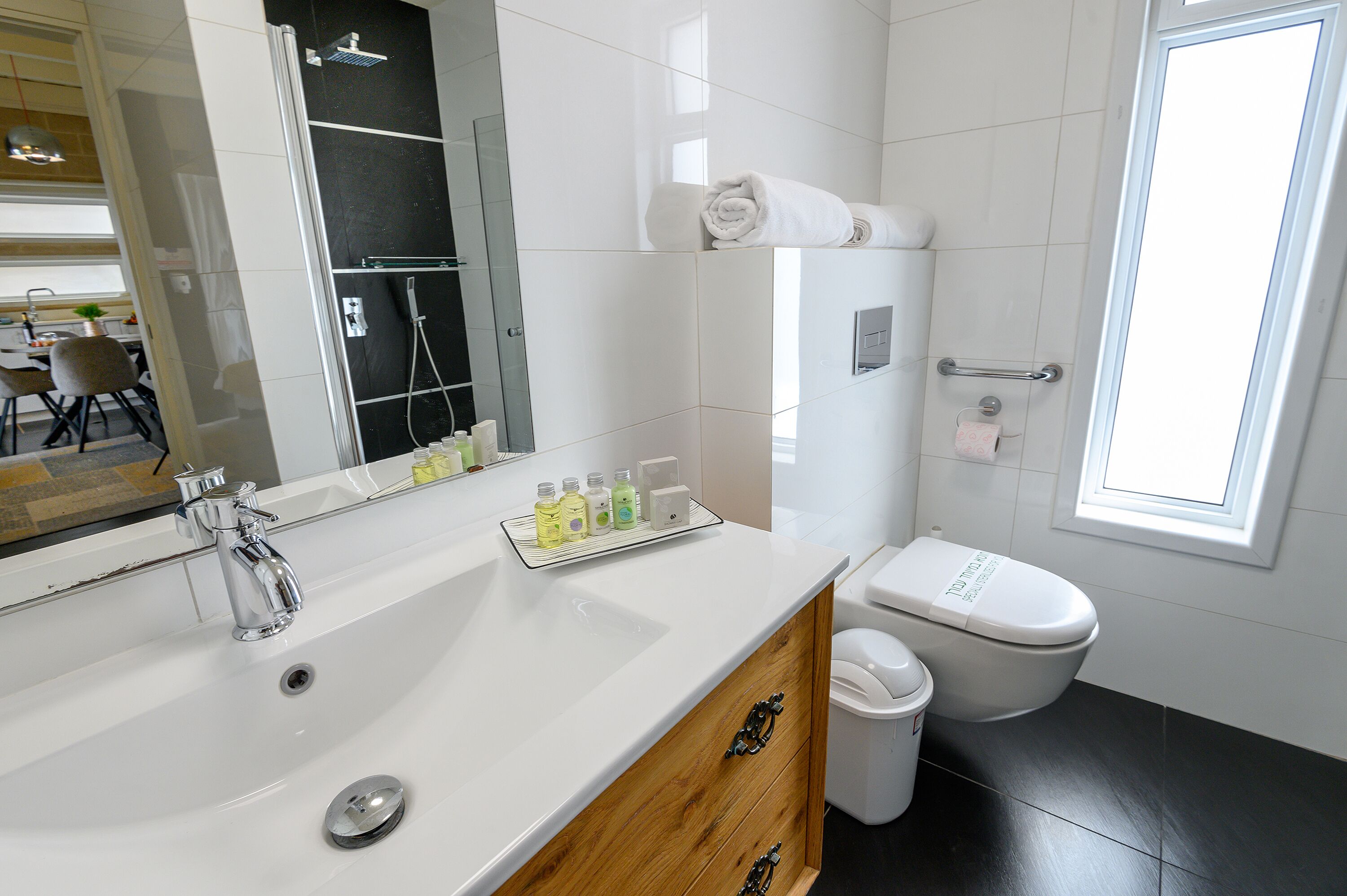 Combined shower/tub, free toiletries, bathrobes, slippers