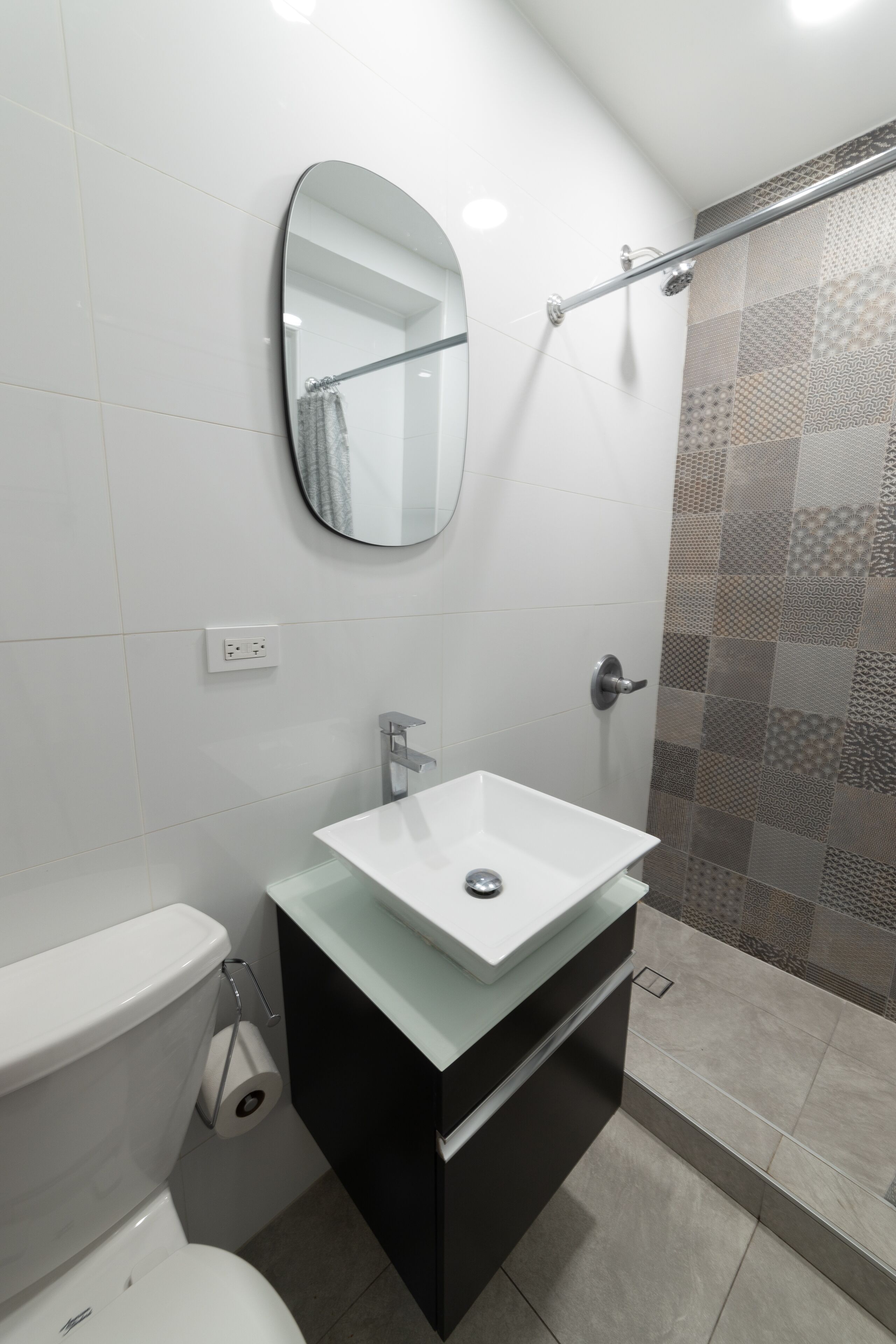 economy room, 1 queen bed, non smoking | bathroom | shower, free toiletries, hair dryer, towels