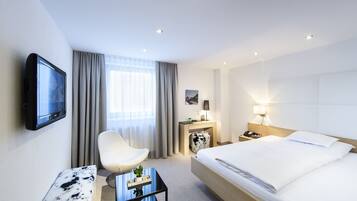 Deluxe-Einzelzimmer (Nova) | Allergikerbettwaren, individuell eingerichtet, Schreibtisch