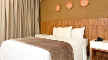 Suite Deluxe | Minibar, escritorio, cortinas blackout y insonorización