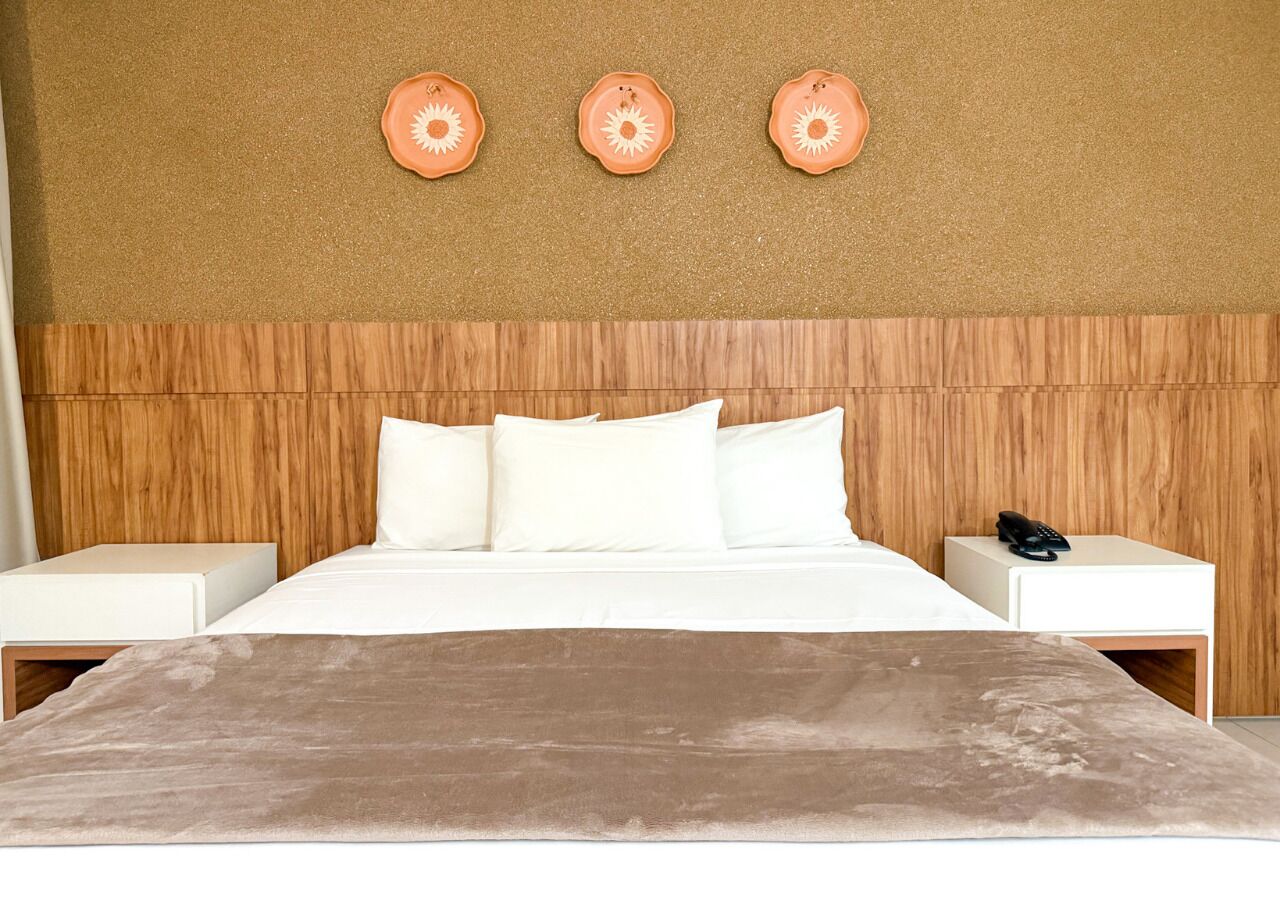 Suíte luxo | Frigobar, escrivaninha, cortinas blackout, quartos à prova de som