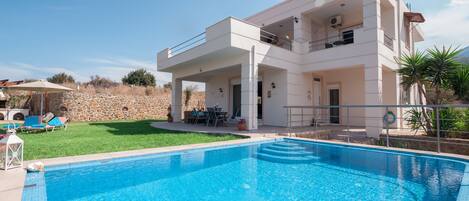 Outdoor pool, pool umbrellas, pool loungers