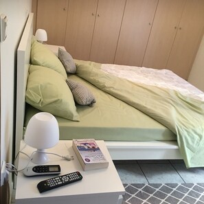 Blackout drapes, iron/ironing board, free WiFi, bed sheets