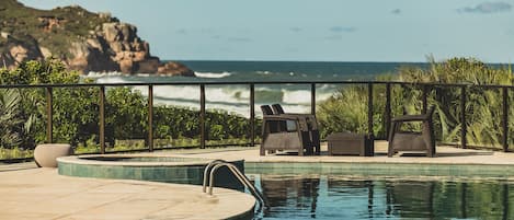 Outdoor pool, pool umbrellas, sun loungers