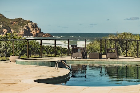 Outdoor pool, pool umbrellas, sun loungers