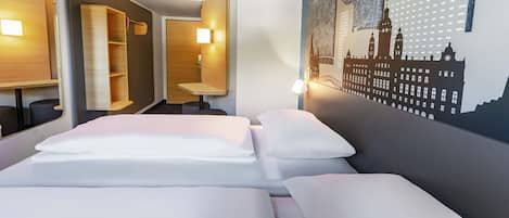 Een bureau, verduisterende gordijnen, geluiddichte muren, gratis wifi