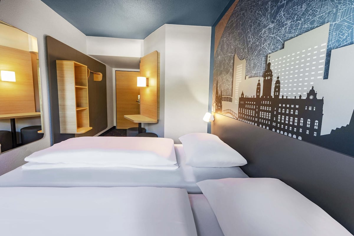 Chambre avec lits jumeaux | Bureau, rideaux occultants, chambres insonorisées, Wi-Fi gratuit