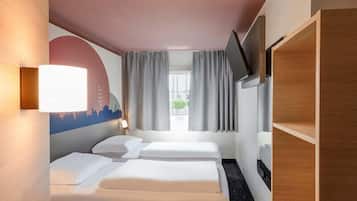 Zweibettzimmer | Schreibtisch, Verdunkelungsvorhänge, schallisolierte Zimmer