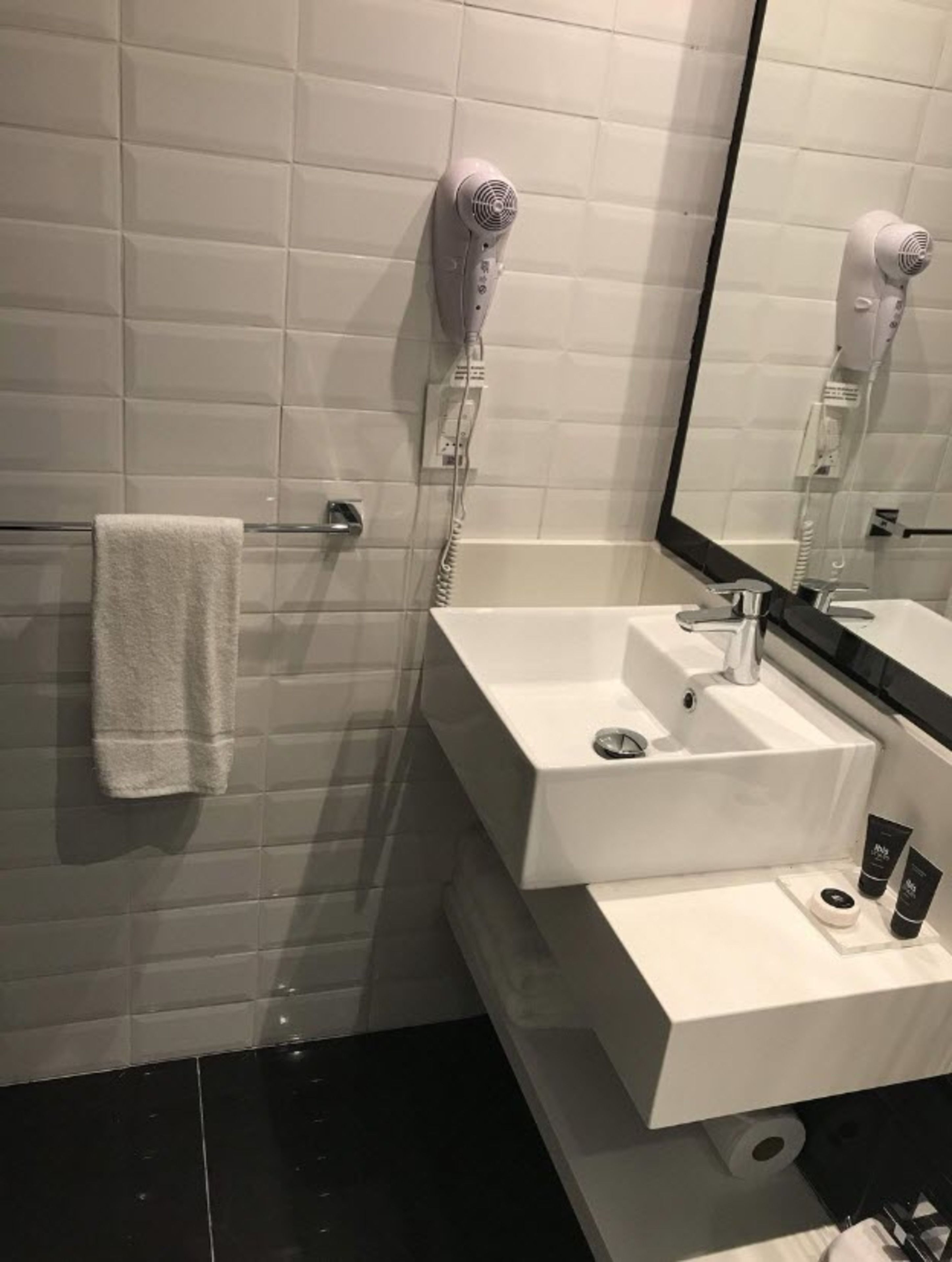 shower, eco-friendly toiletries, hair dryer, towels