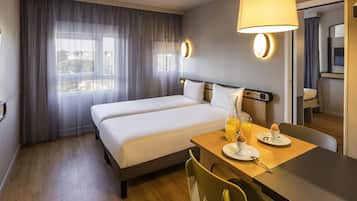 Studio, Twin Beds | In-room safe, desk, free cribs/infant beds, free WiFi