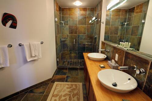 Deluxe Condo, 2 Bedrooms, Ocean View | Bathroom | Separate bathtub and shower, deep-soaking bathtub, hair dryer, towels