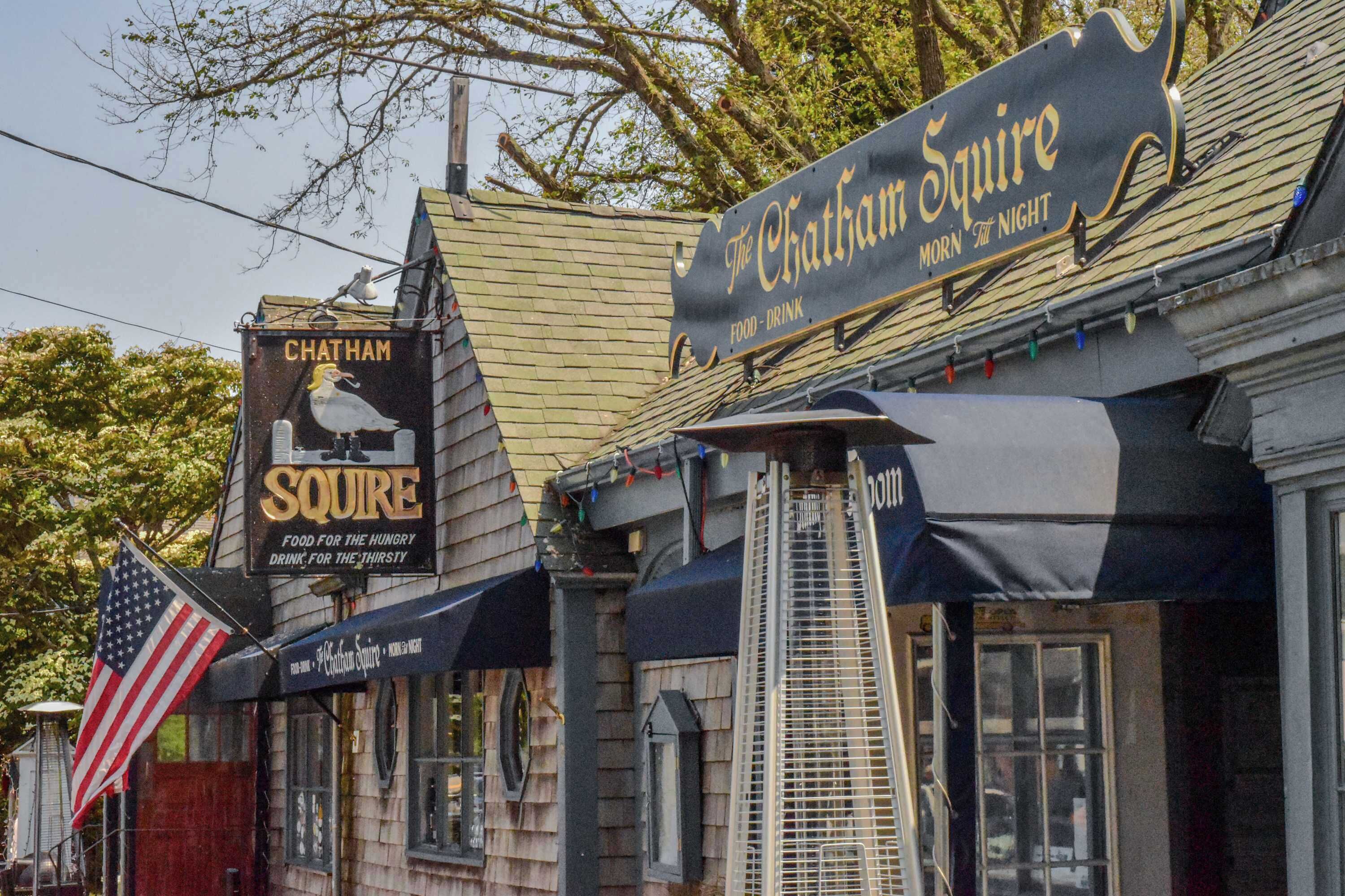 A row of buildings with signs for 'Chatham Squire' and 'Chatham Squire Food - Drink'.