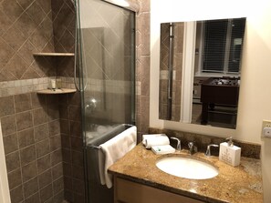 Bathtub, jetted tub, hair dryer, towels