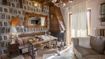 Deluxe Chalet | Living area | 43-inch Smart TV with cable channels, fireplace, Netflix