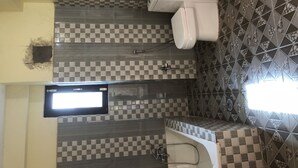 Basic Room, Multiple Beds, Non Smoking | Bathroom - Chitwan Homestay (Gunjanagar)