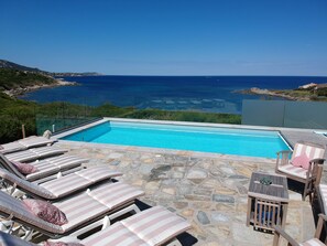 A heated pool - Shorefront villa offers great amenities and views giving onto the beach below (Corbara)