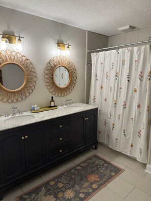 Shower, towels, soap, toilet paper