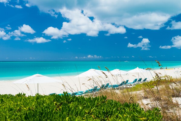 On the beach, sun loungers, beach towels