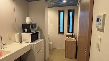Deluxe Triple Room | Private kitchenette | Fridge, microwave, electric kettle, toaster oven