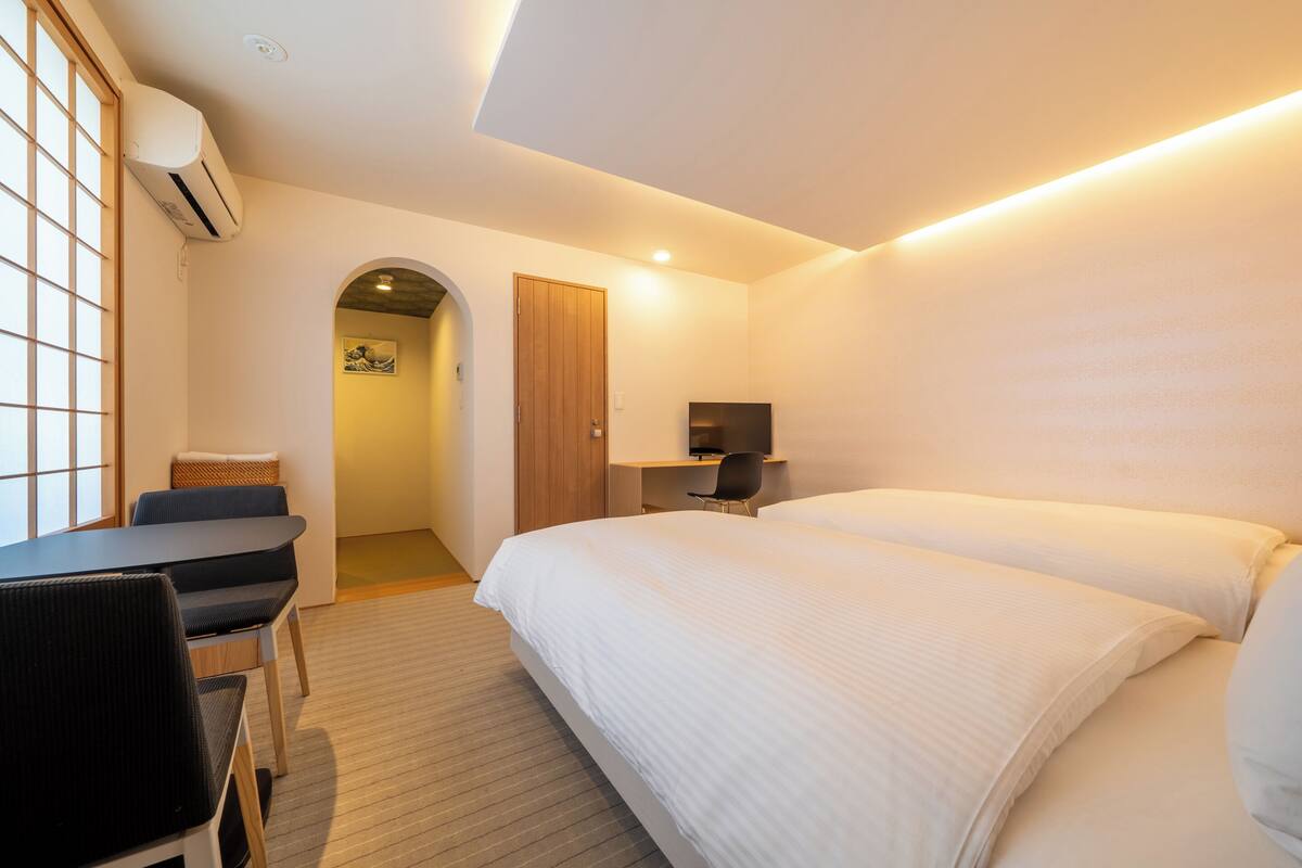 Standard Twin Room | 2 bedrooms, in-room safe, desk, blackout drapes